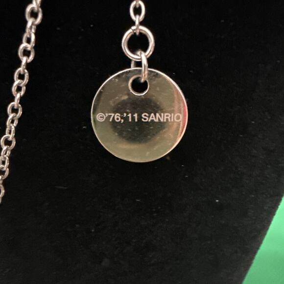 SWAROVSKI SANRIO HELLO KITTY CRYSTAL FACE JET GOLD RIBBON NECKLACE - Picture 12 of 13